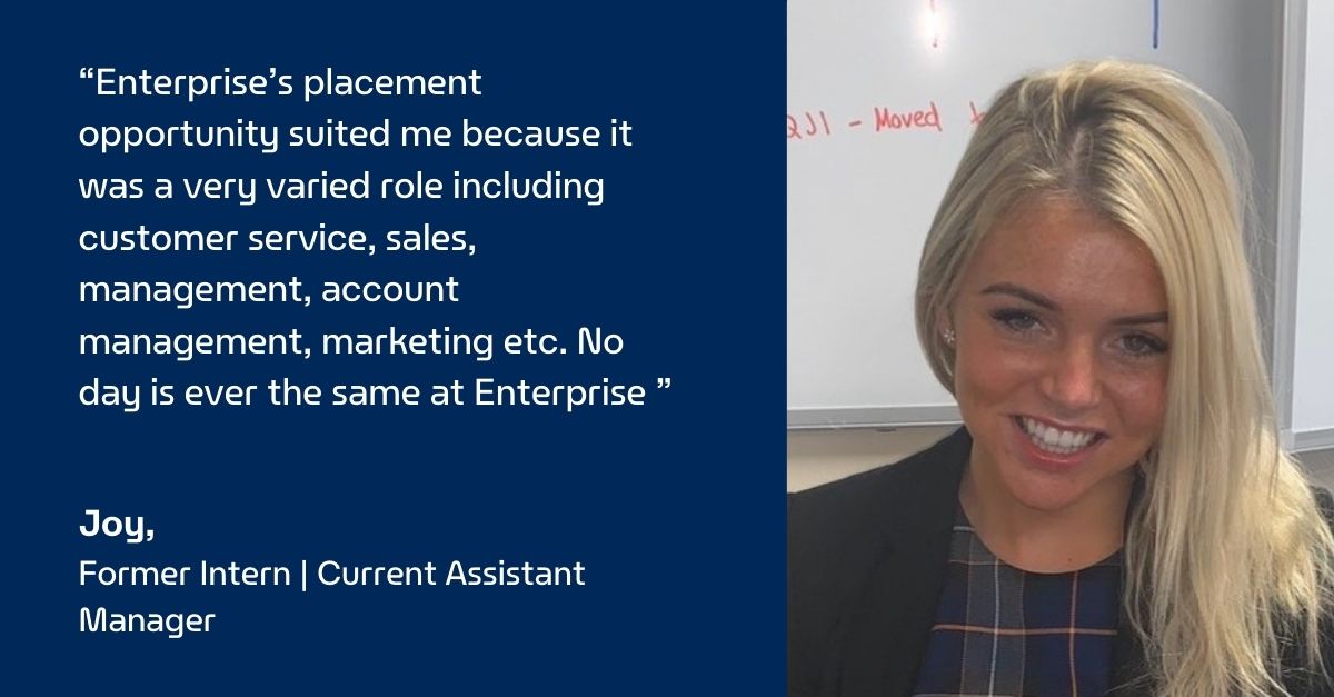 Picture of Joy in front of a whiteboard with a quote on a blue background