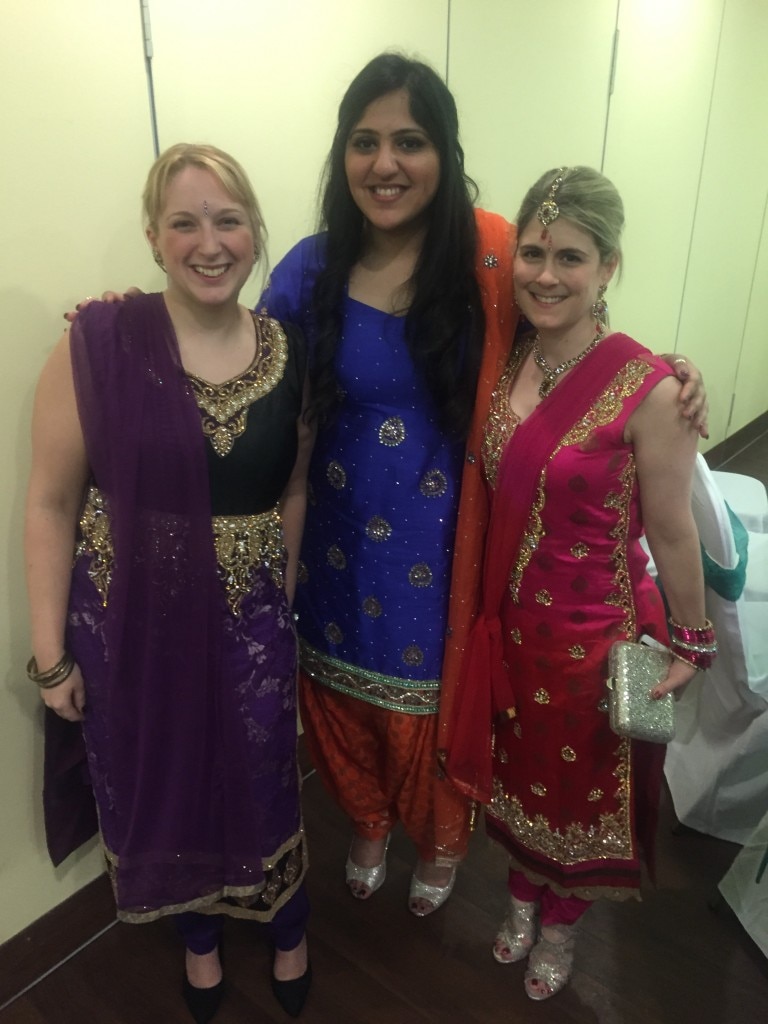 Three women in tradtional Indian clothing