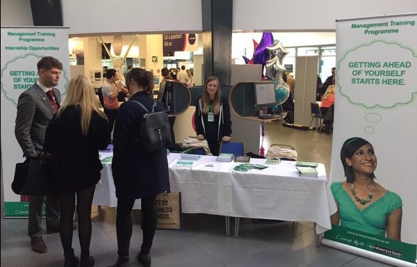 People interacting at a job fair